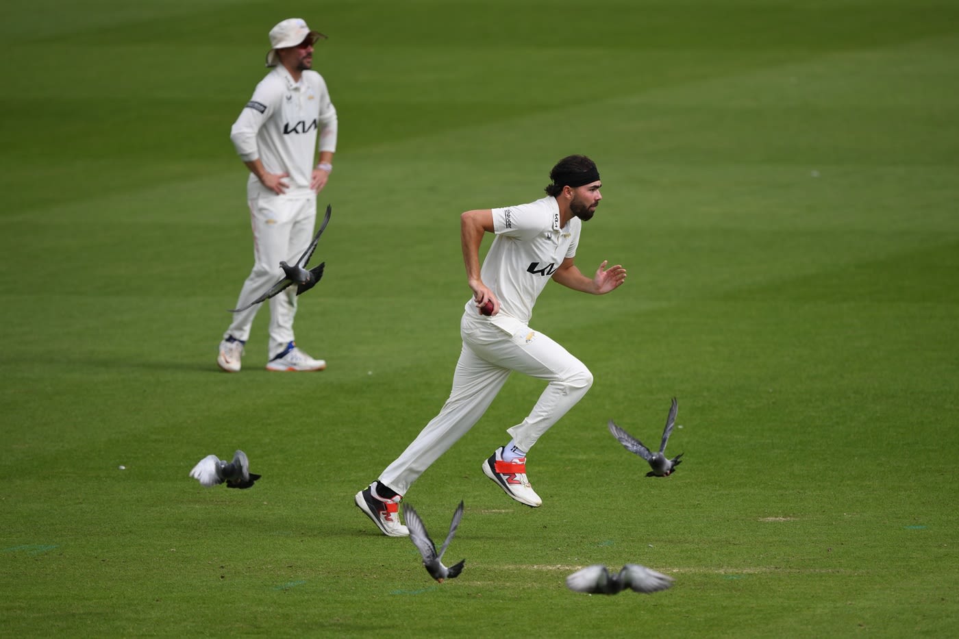 James Taylor runs in to bowl