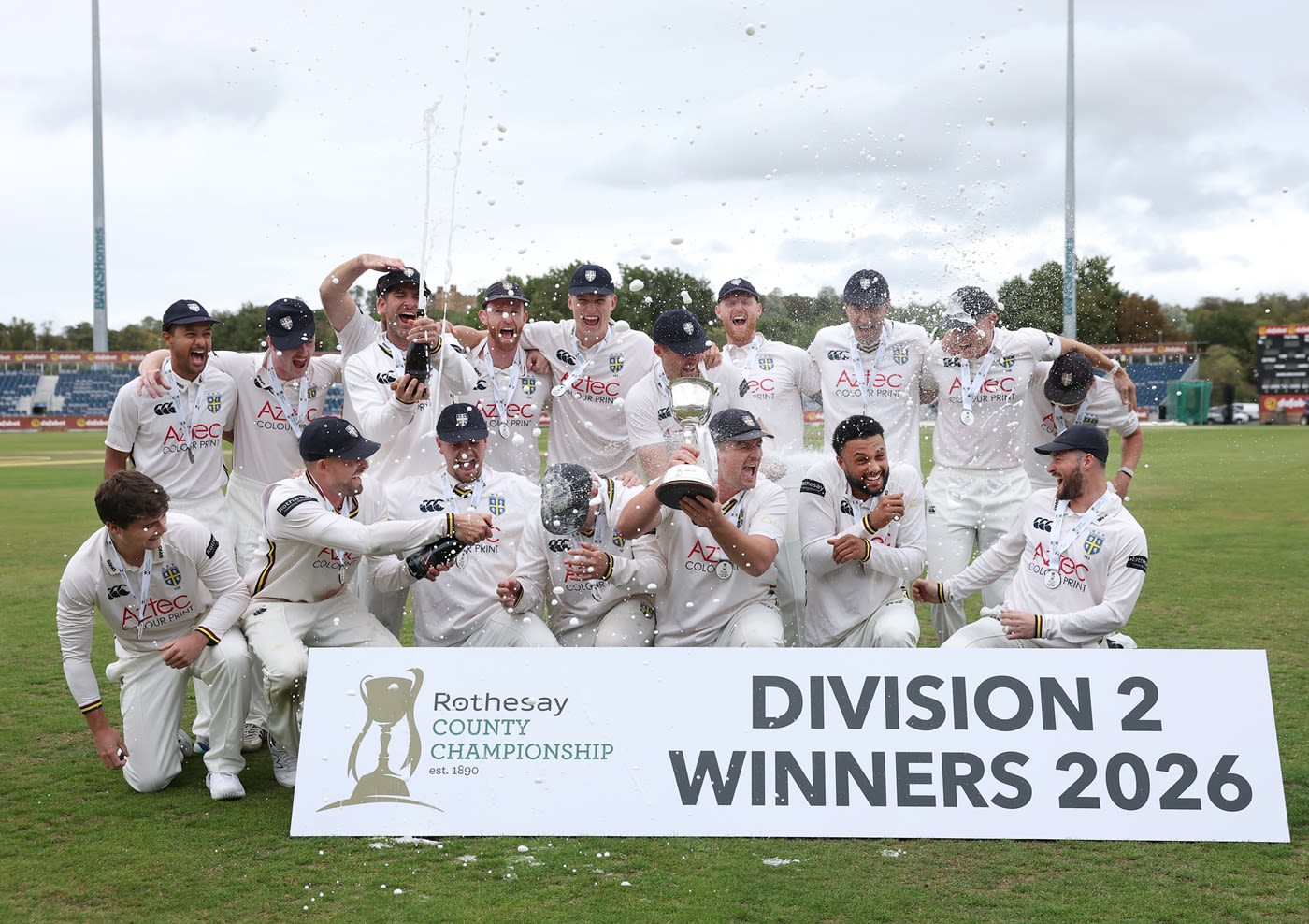 Durham celebrate winning the Division Two title