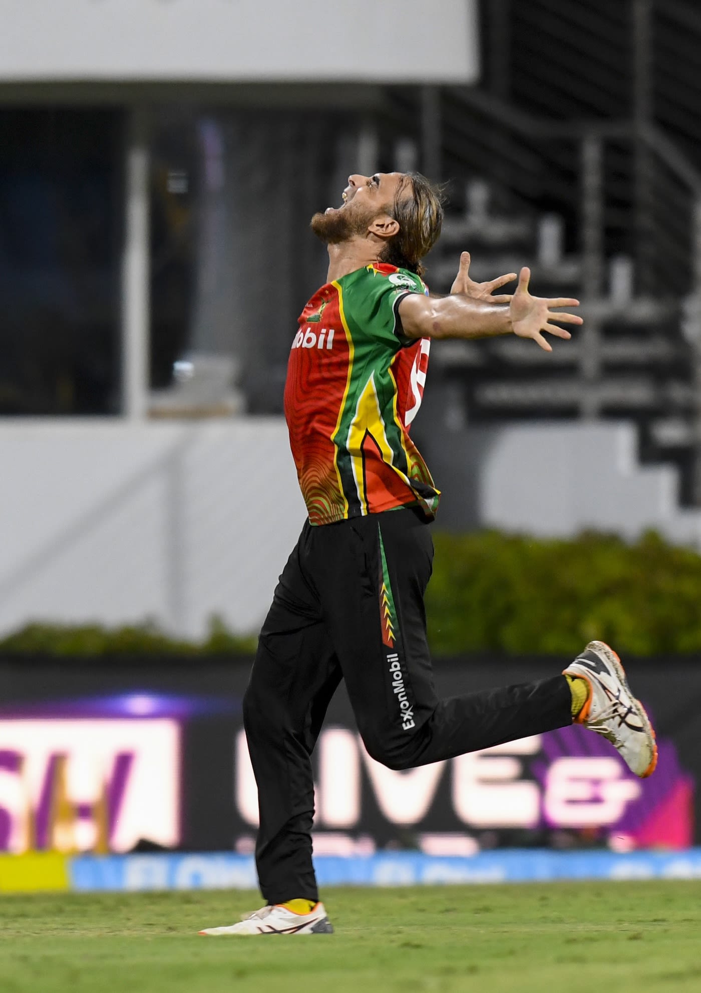 Imran Tahir sets off in celebration for the last time this season
