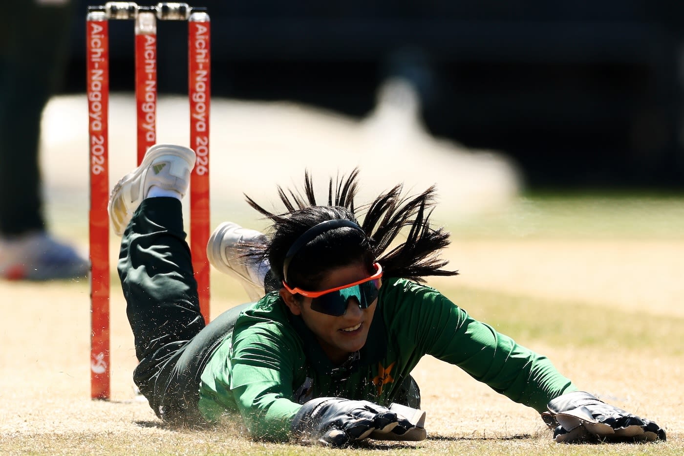 Gull Feroza puts in a big dove behind the stumps