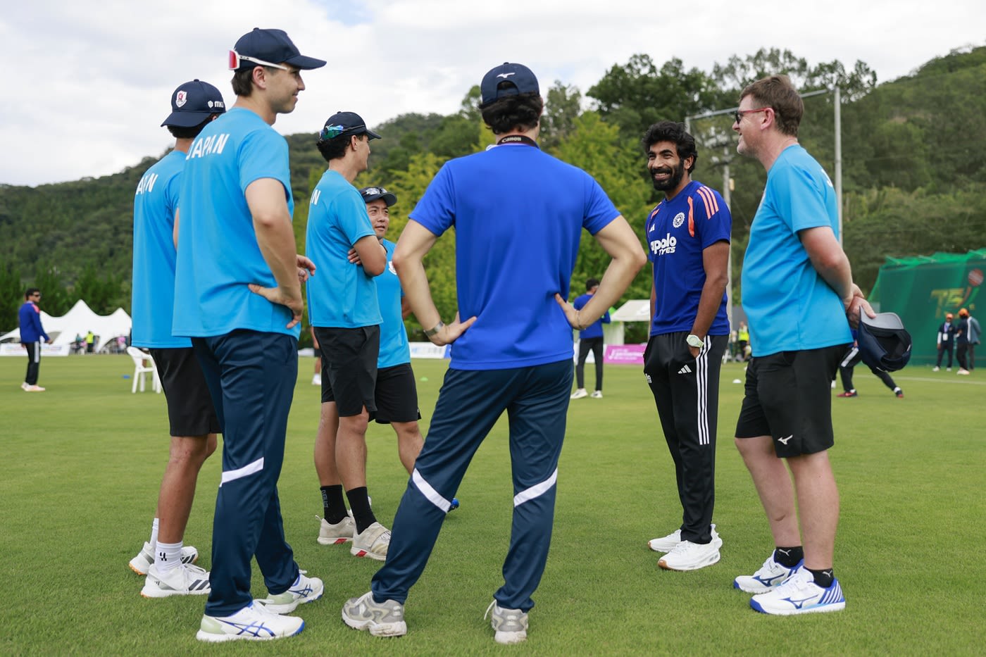 Jasprit Bumrah has a word with the Japanese players