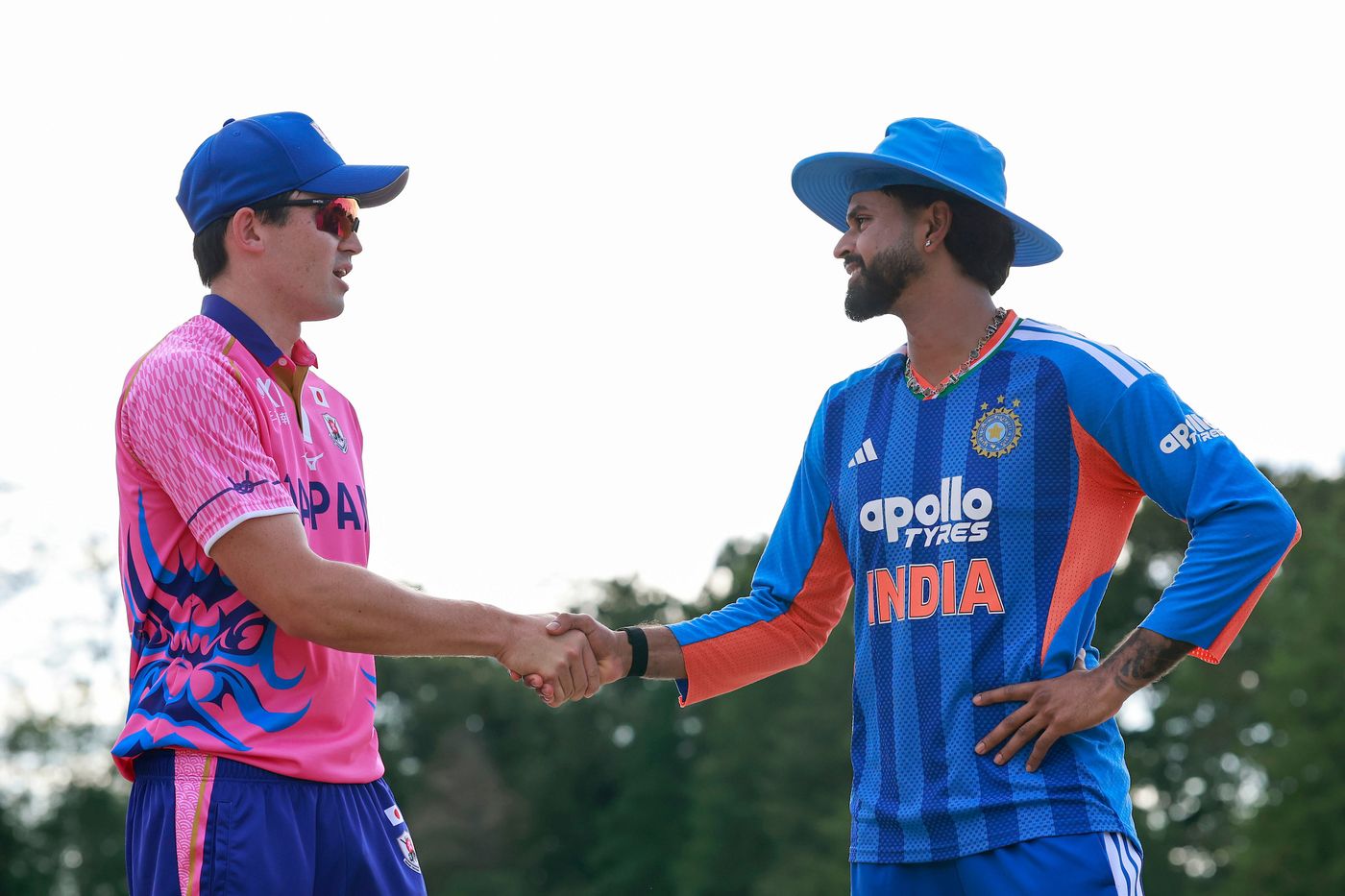 Kendel Kadowaki-Fleming and Shreyas Iyer shake hands at the toss