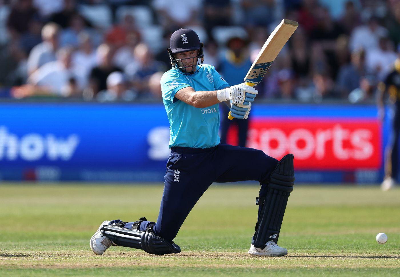 Joe Root drives through the covers