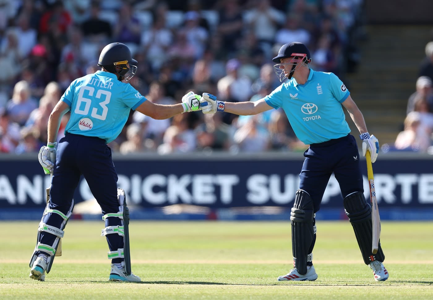 Jos Buttler and Harry Brook punch gloves