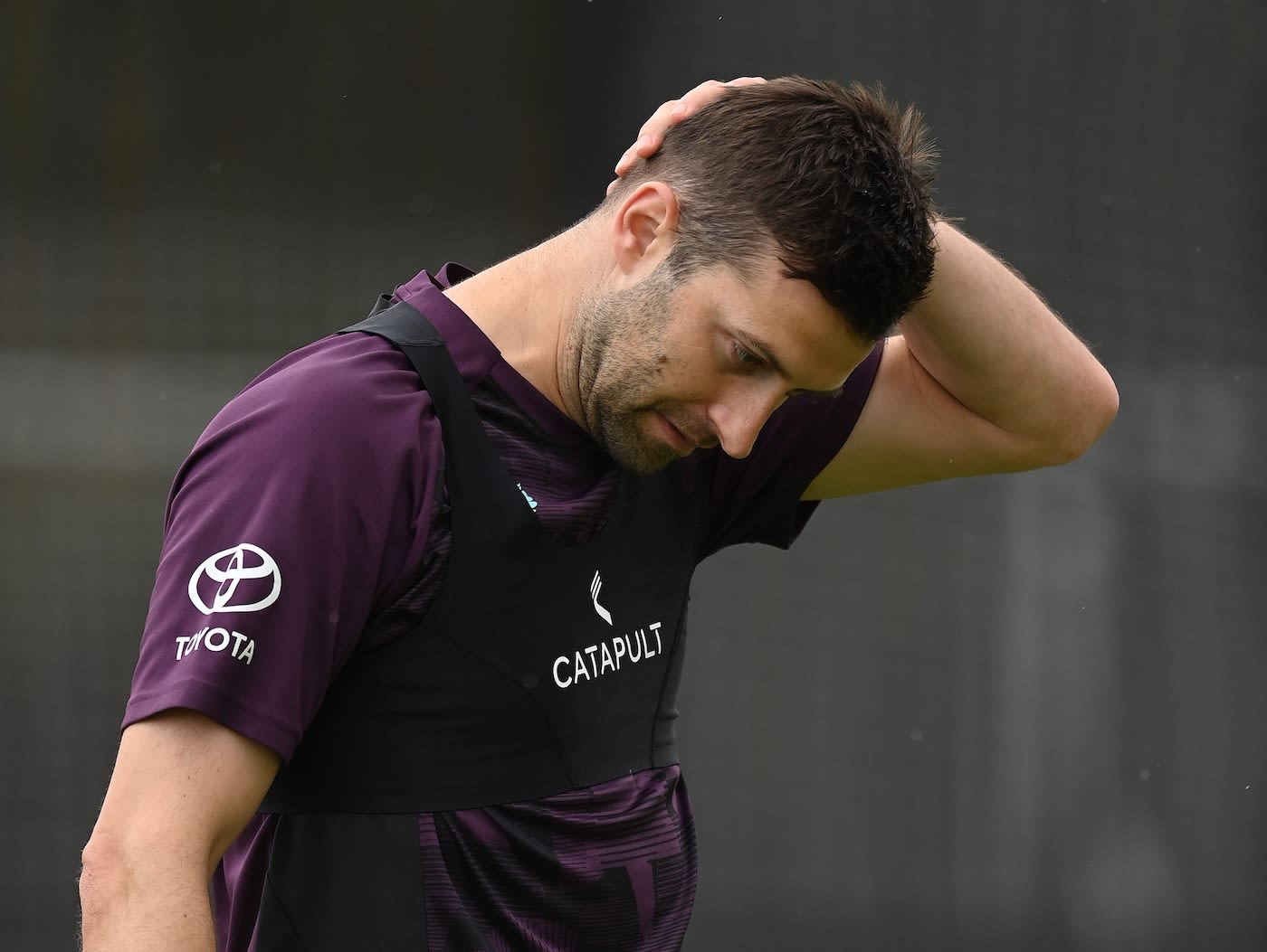 Mark Wood ponders during training