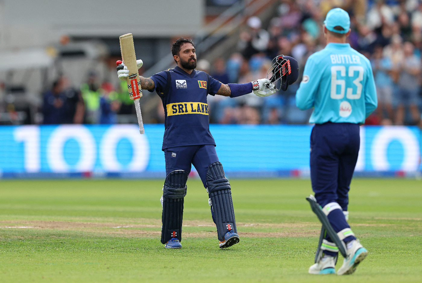 Kusal Mendis celebrates an 82-ball hundred