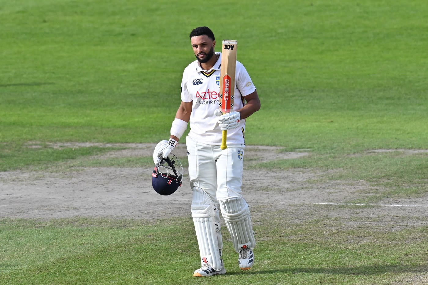 Emilio Gay acknowledges his hundred