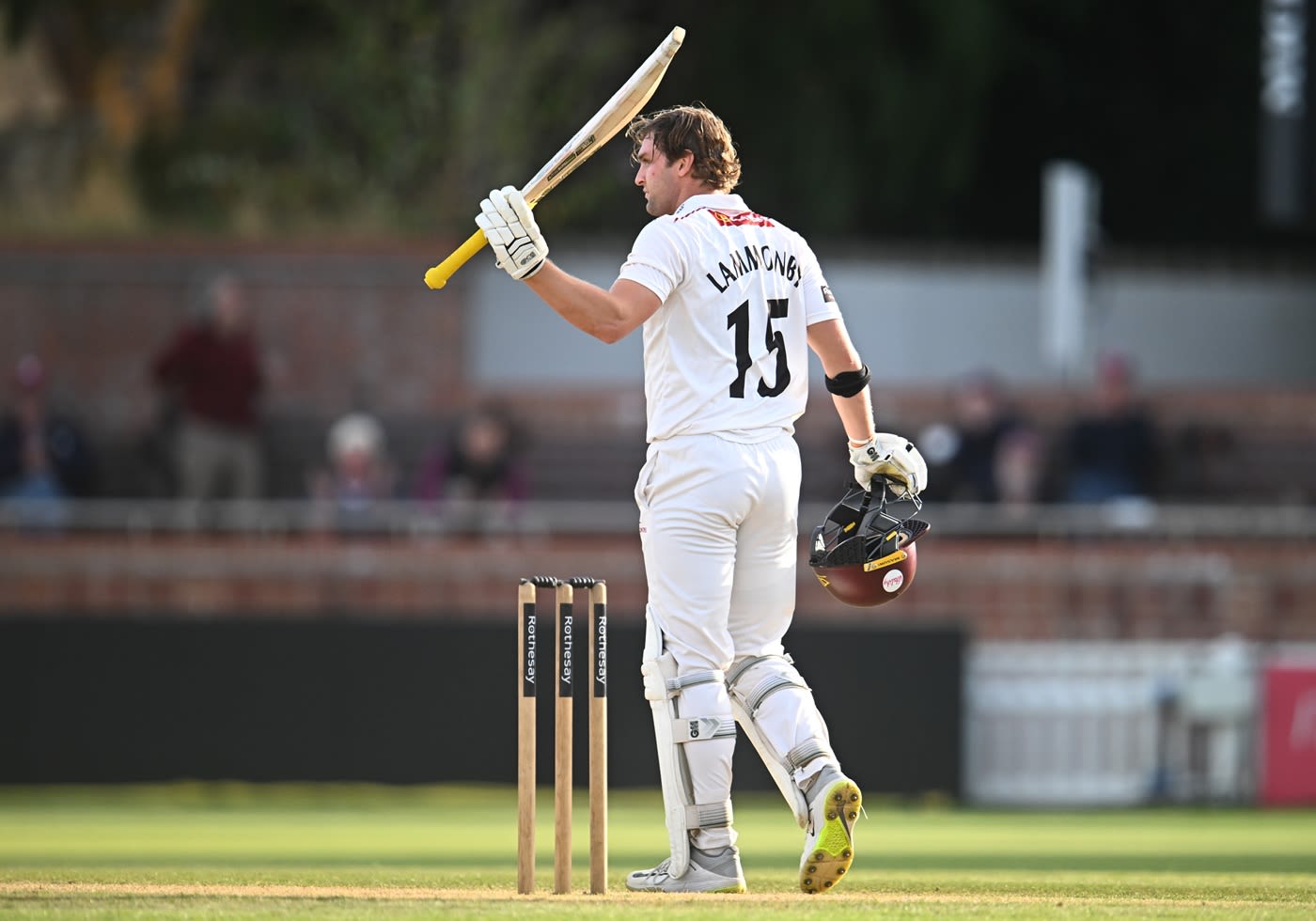 Tom Lammonby raises his bat for three figures