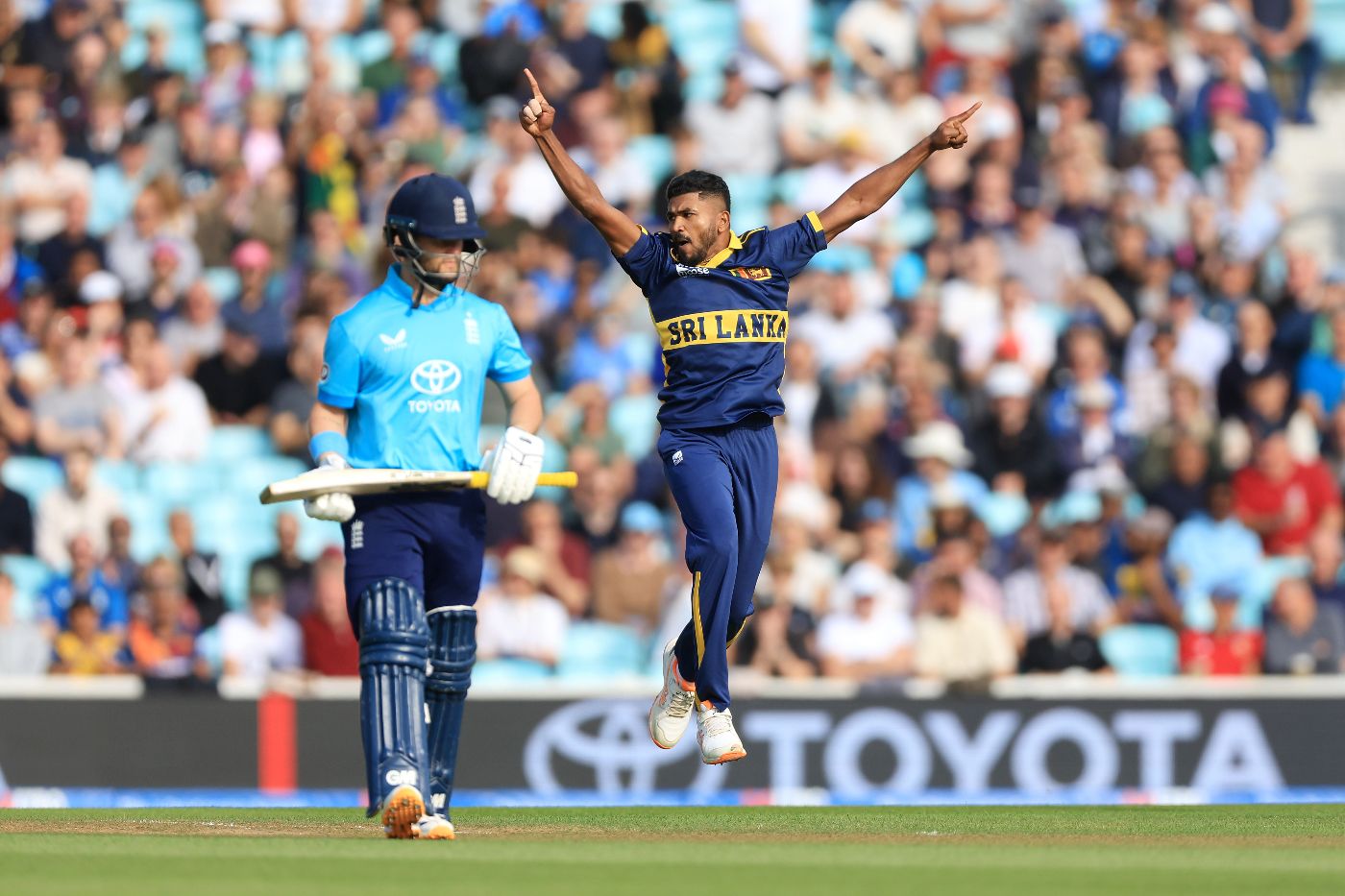 Dilshan Madushanka leaps for joy after bowling Ben Duckett