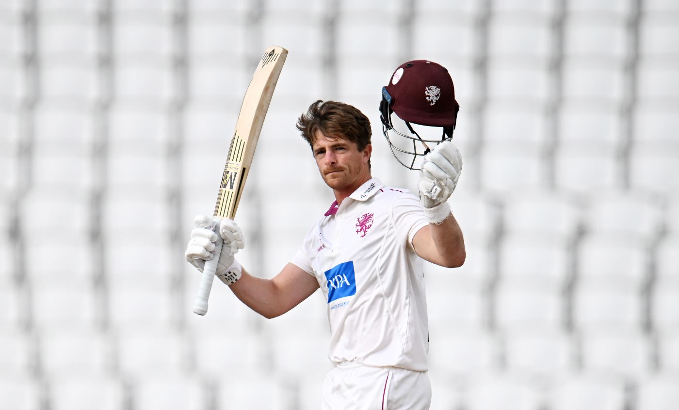 Tom Abell salutes the crowd after reaching his triple-century