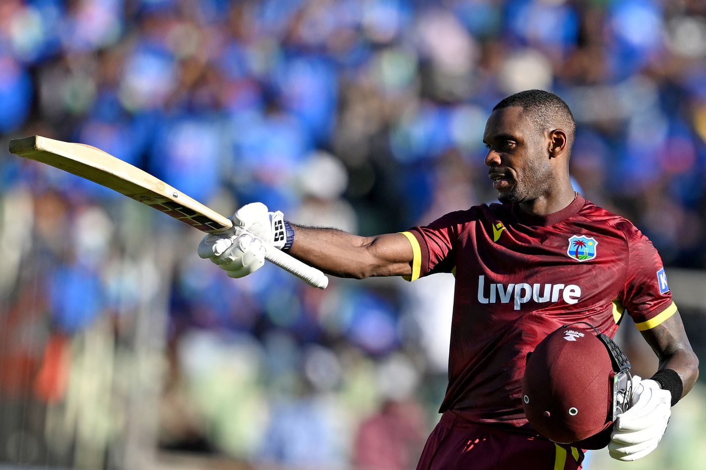 Justin Greaves celebrates his maiden ODI century