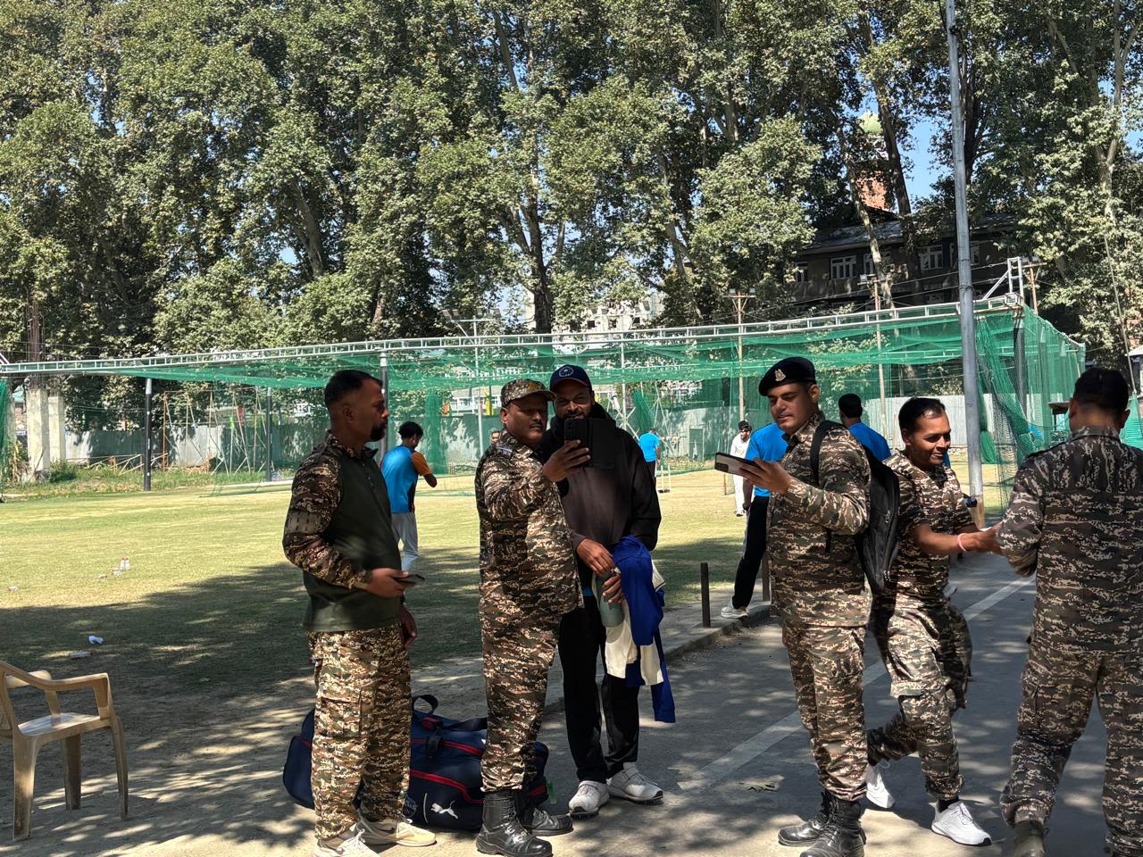 Security personnel pose with Mukesh Kumar