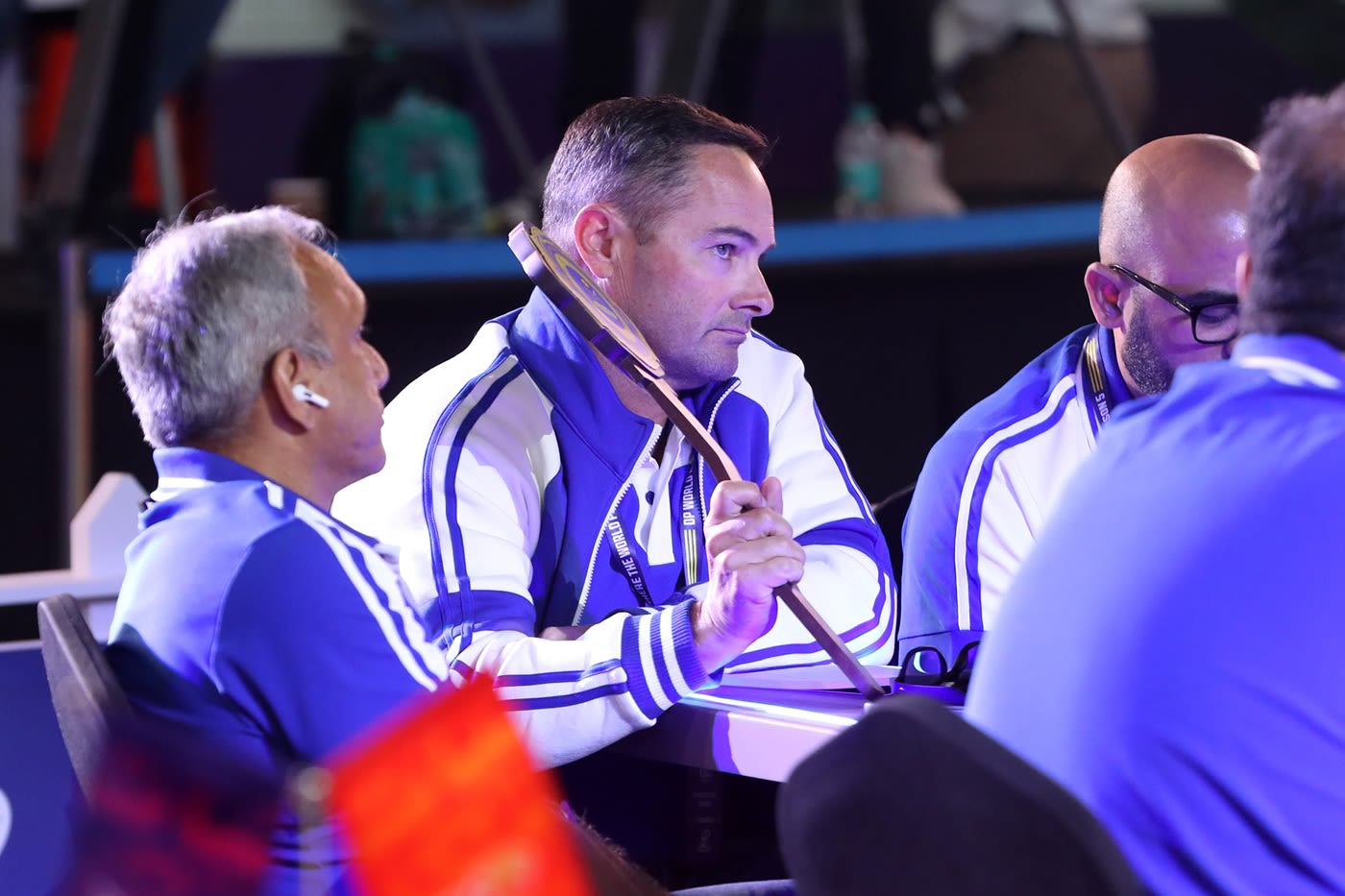 Coach Mark Boucher raises the paddle for MI Emirates at the ILT20 auction