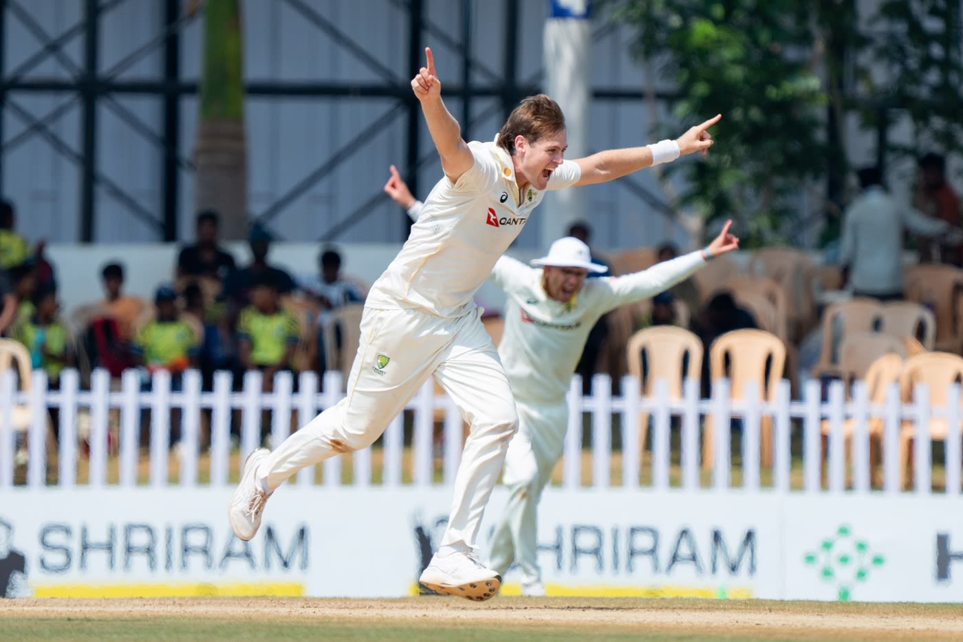 Liam Scott wheels away after taking a wicket