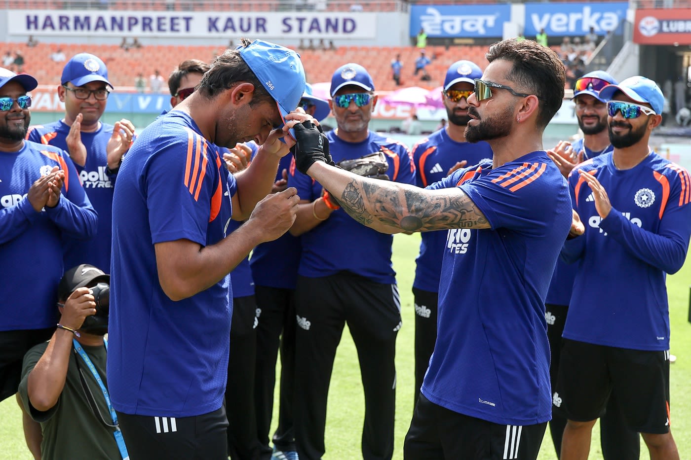 Anshul Kamboj gets his cap from Virat Kohli