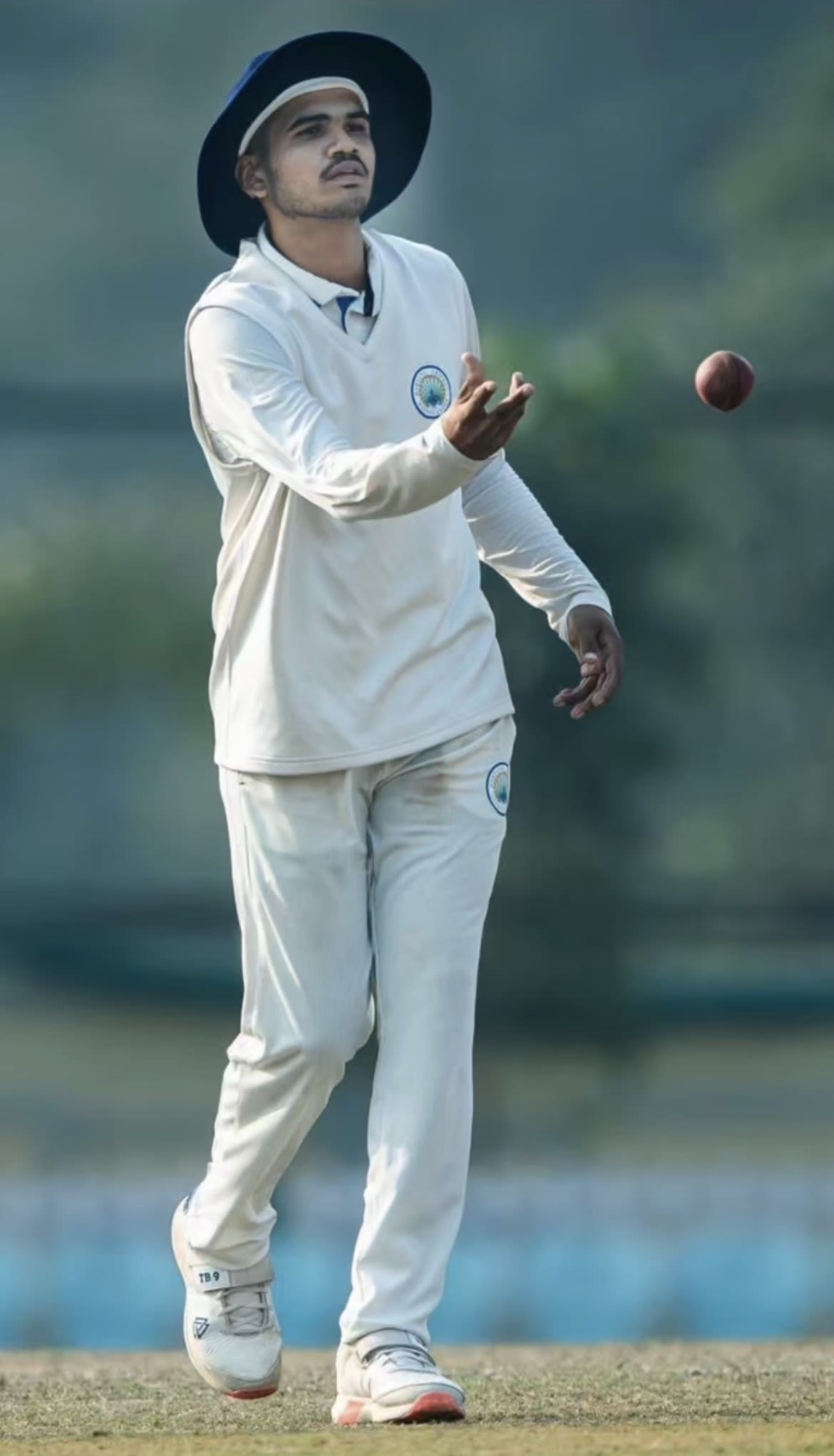 Tanmay Baloda tosses the ball back