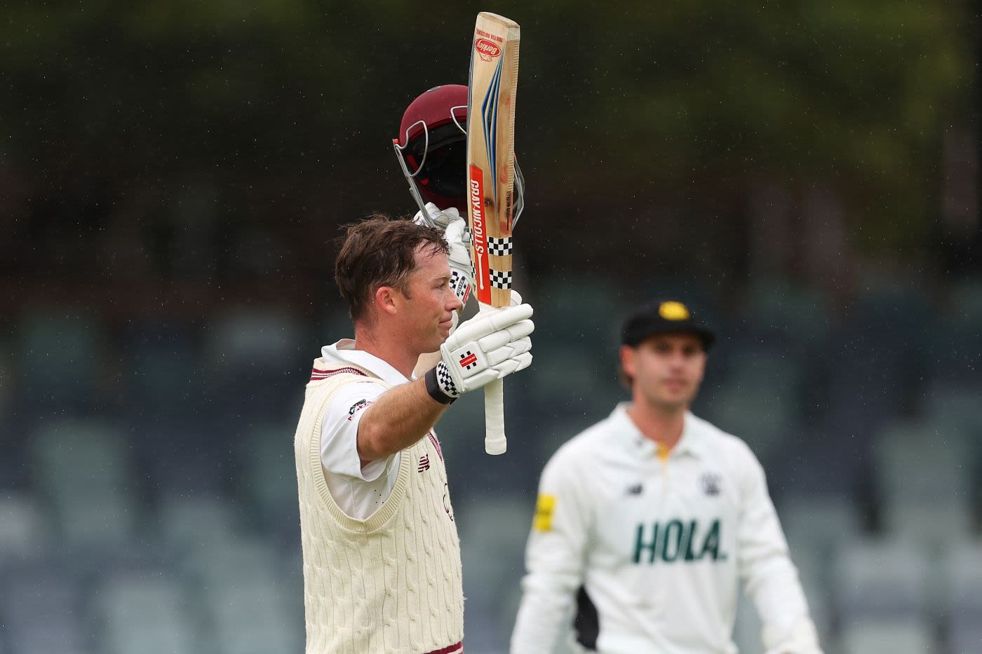 Jimmy Peirson celebrates his century