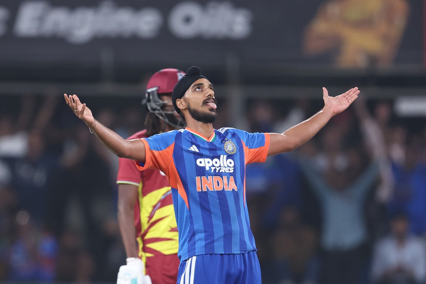 Arshdeep Singh celebrates after knocking over Sherfane Rutherford