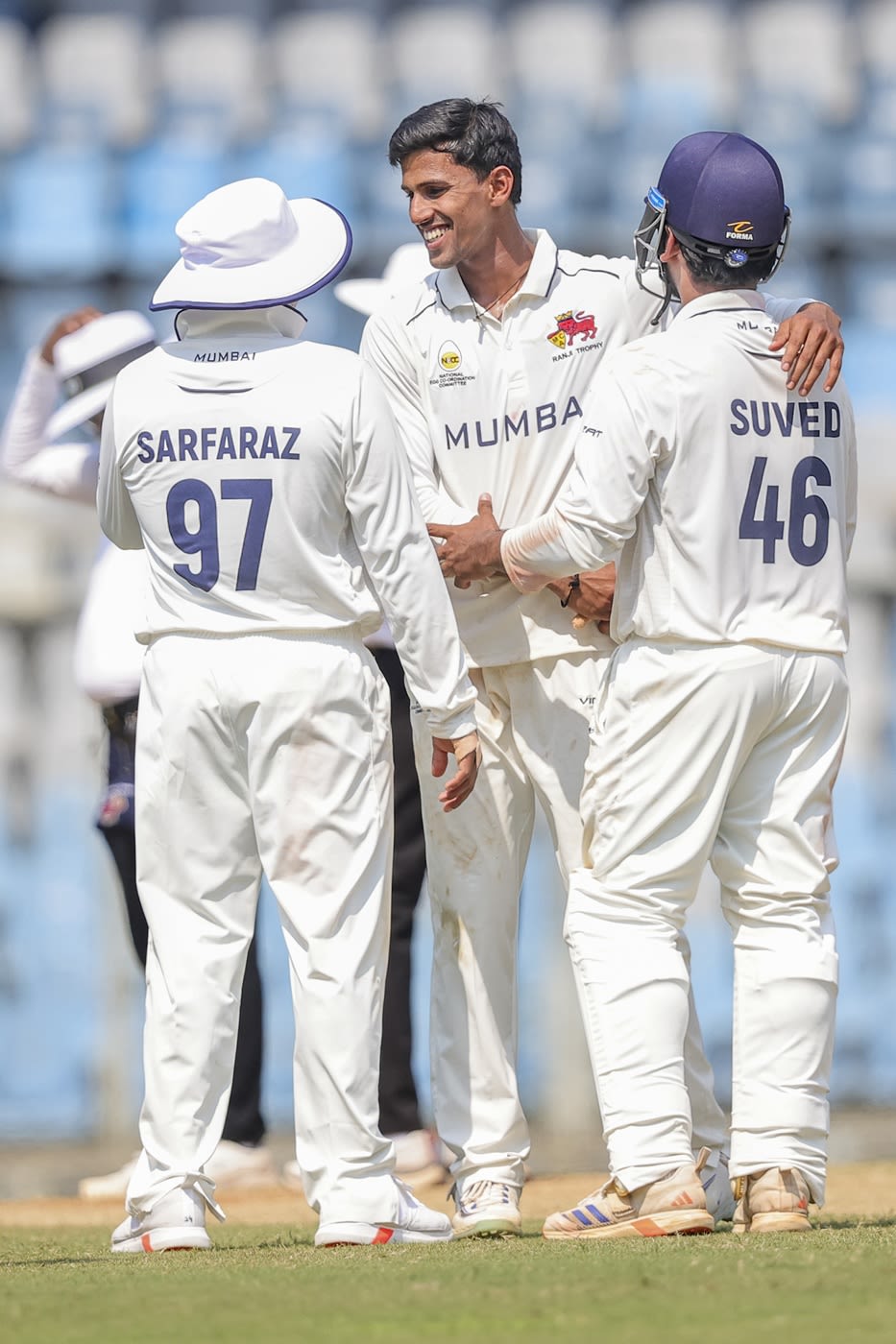 Tanush Kotian celebrates a wicket