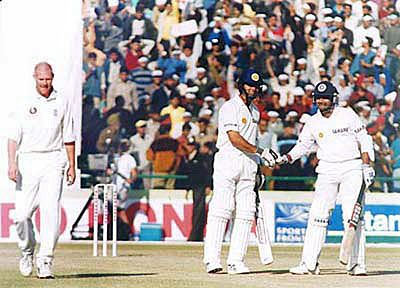 Deep Dasgupta and Iqbal Siddiqui celebrate after the winning runs are hit
