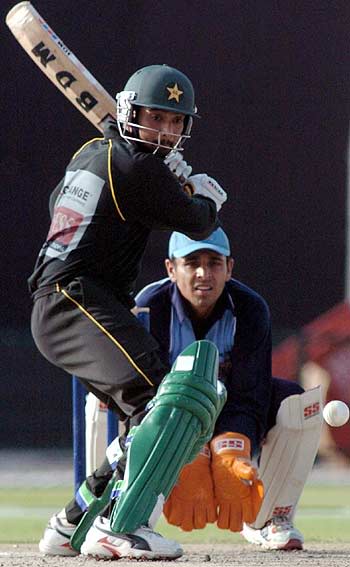 Asim Kamal pushes one to the off side