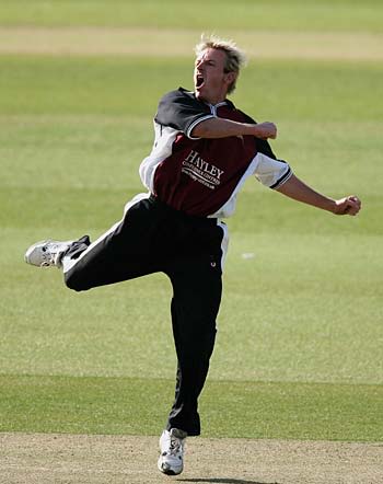 Damien Wright celebrates one of his four wickets