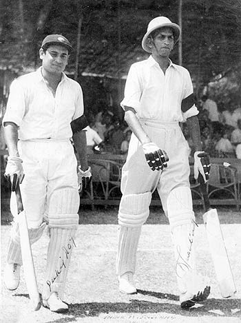 Mushtaq Ali goes out to bat with Pankaj Roy