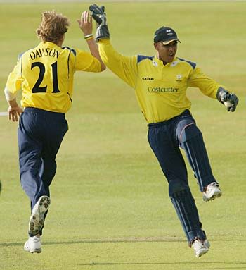 Ismail Dawood and Richard Dawson celebrate