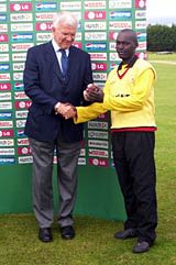 Malcolm Speed presents Joel Olwenyi with the Man-of-the-Match award