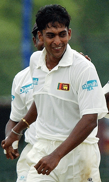 Gayan Wijekoon celebrates his maiden Test wicket
