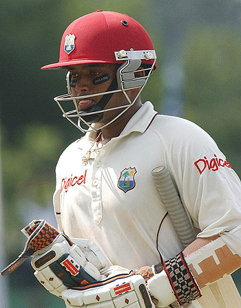 Ryan Ramdass walks back after being dismissed by Chaminda Vass