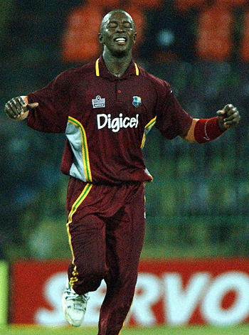 Deighton Butler celebrates the wicket of Sanath Jayasuriya