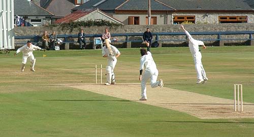 Adrian McCoubrey bowling Neil MacRae