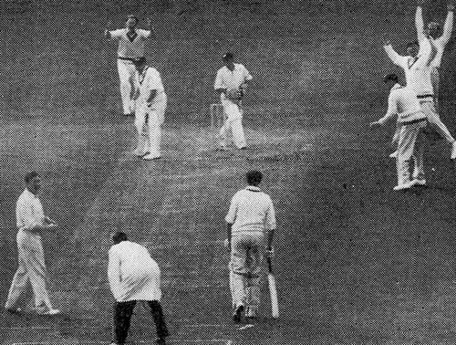Jim Laker takes his tenth wicket as Jack Wilson is caught by Roy Swetman