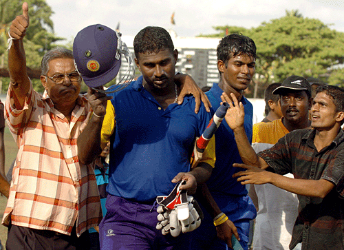 Avishka Gunawardene and Upul Tharanga are mobbed by fans