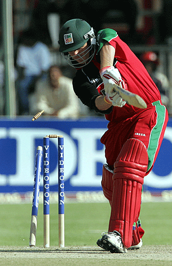 Gavin Ewing has his off stump pegged back by Irfan Pathan