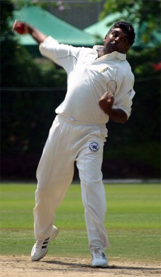 Rahul Sharma bowling at KCC