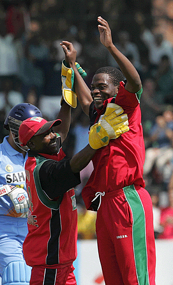 Blessing Mahwire and Tatenda Taibu celebrate Virender Sehwag's wicket