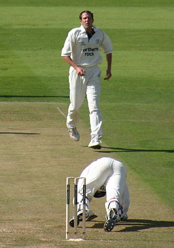 David Fulton is sent sprawling by Alan Richardson
