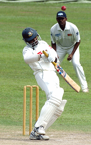 Manjural Islam Rana sways away from a bouncer