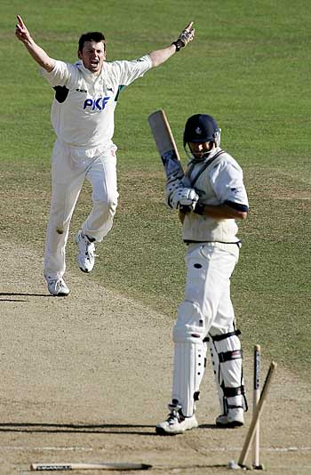 Andrew Harris celebrates one of his six wickets