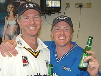 Callum Thorp and Brad Williams celebrate Durham's promotion