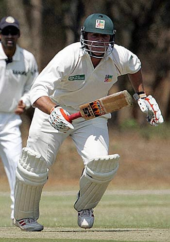 Terry Duffin scrambles a single