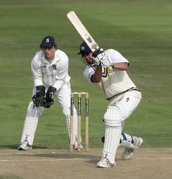 Grant Hodnett punches one through the covers
