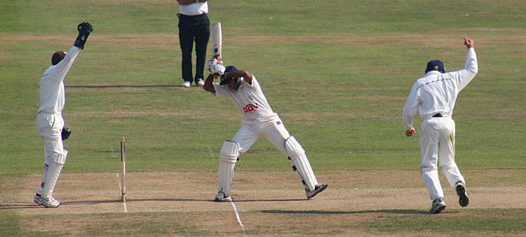 Rana Naved-ul-Hasan is controversially given out, caught by David Fulton