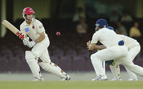 Greg Blewett pops up a catch to Phil Jacques