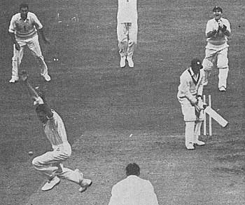 Peter Loader bowls Roy Gilchrist to take a hat-trick