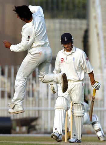 Mohammad Irshad celebrates taking the wicket of Alex Loudon