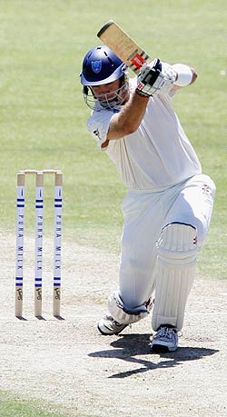 Matthew Phelps drives during his innings of 37