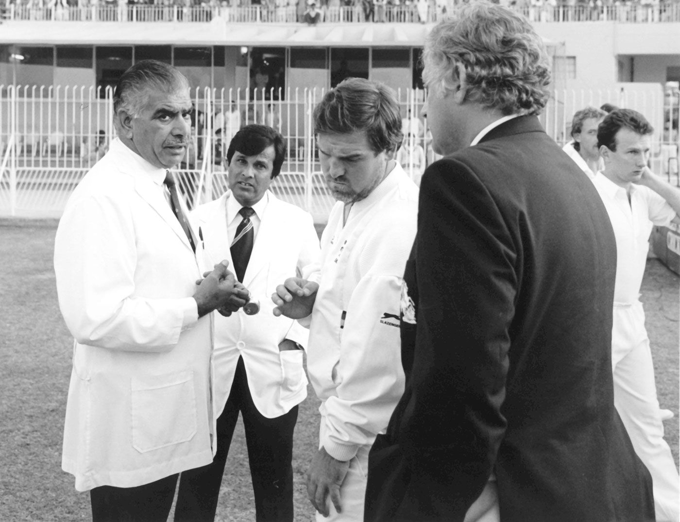 Mike Gatting, Shakoor Rana and Peter Lush, the England manager, after the uneasy truce
